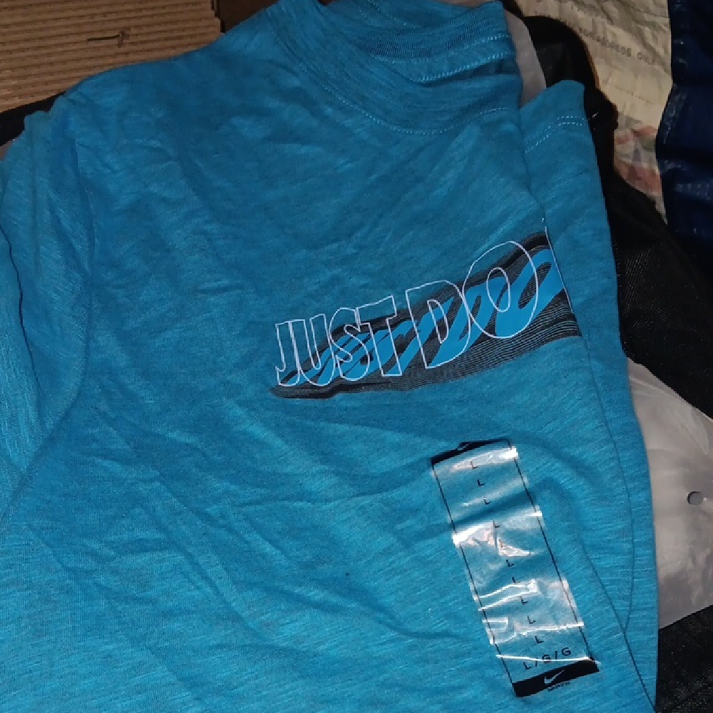 Nike Teal T-Shirt with Graphic Logo